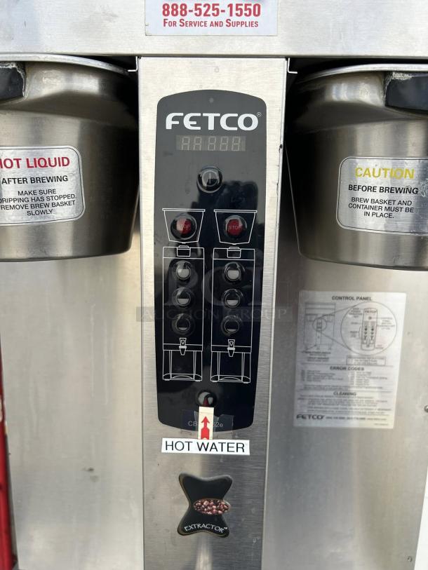 Fetco CBS-2052e dual station coffee brewer in amazing condition. Features control panel, 208-240V, fully tested.