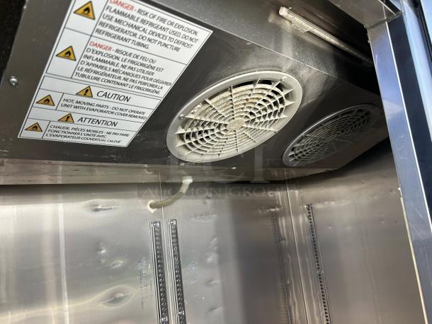 Turbo Air M3H47-2 heated cabinet interior with fan vents and safety caution labels visible. Excellent condition.