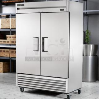 True T-49-HC Reach-In Refrigerator, solid swing doors, tested working condition, stainless steel exterior on casters.