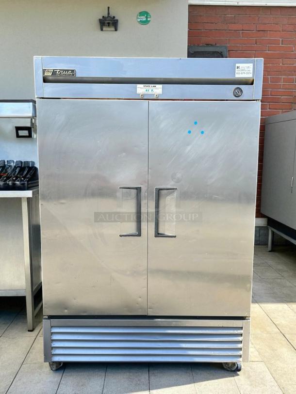 True T-49-HC reach-in refrigerator, solid swing doors, stainless steel, tested and working, visible labels and markings.
