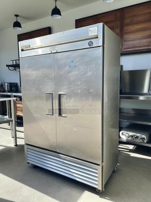 True T-49-HC Reach-In Solid Swing Door Refrigerator, stainless steel, tested and working condition, visible control panel.