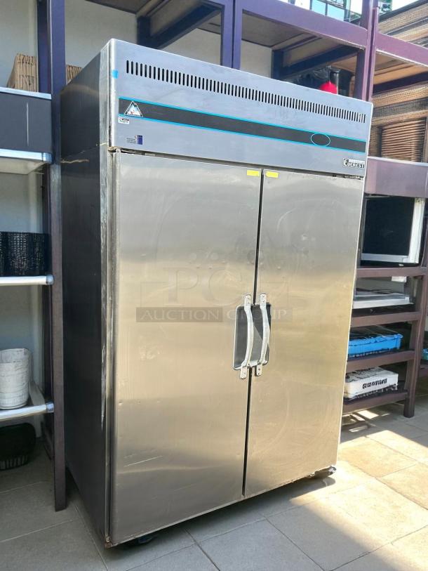 Everest ESR2 reach-in refrigerator, excellent condition, 49 5/8", two solid doors, tested working, 115v, stainless steel finish.