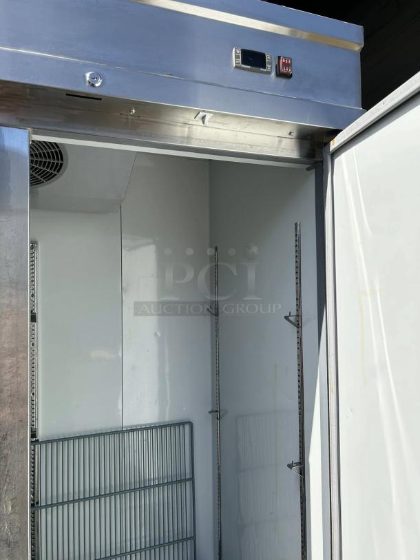 Kintera KBM3F 81" bottom mount freezer, three-section, tested working. Features digital display, shelving, and stainless steel exterior.