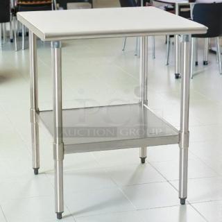 Stainless steel worktop table, 30"x30", great condition, sturdy design with lower shelf, ideal for kitchens or workshops.