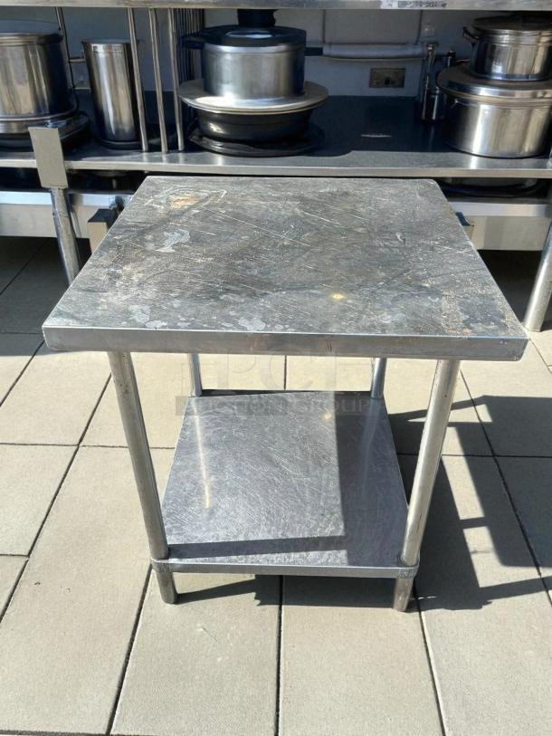 Stainless steel worktop table, 30"x30", great condition, sturdy, lower shelf, ideal for kitchen or workshop use.