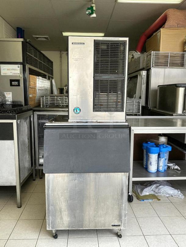 Hoshizaki KM-515MAH crescent cuber icemaker, air-cooled, 115v, tested and working, visible brand label, industrial setting.
