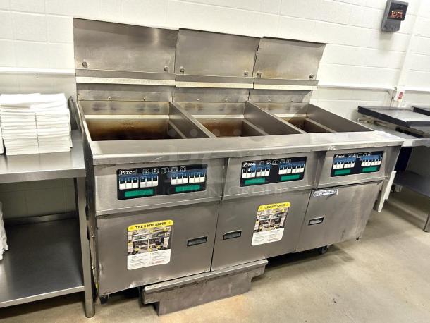 Pitco SSH75 gas fryer with (1) 75 lb vat, stainless steel finish, labeled controls, tested and working, floor model, natural gas.
