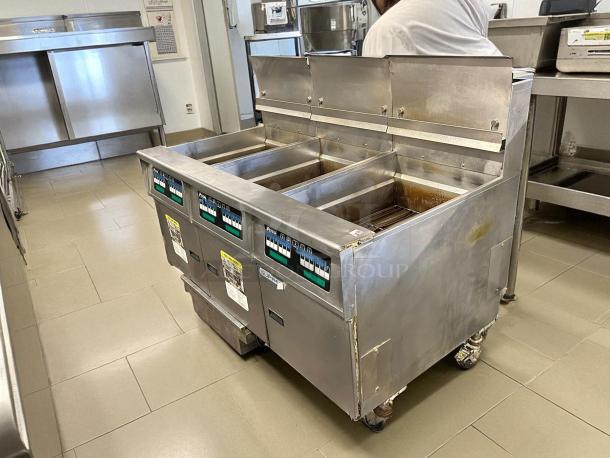 Pitco SSH75 gas fryer, floor model, with 75 lb vat capacity, natural gas, tested and working, stainless steel finish.