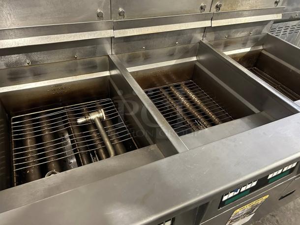 Pitco SSH75 gas fryer, 75 lb vat capacity, floor model, natural gas, clean, tested, and working condition with visible controls.