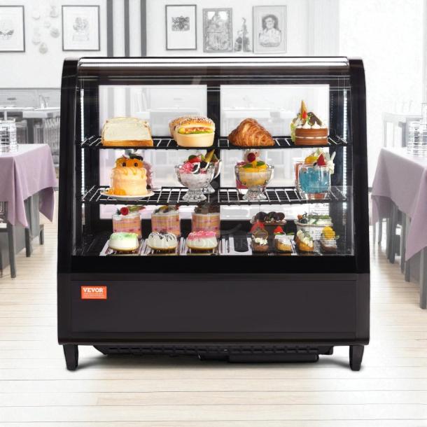 VEVOR refrigerated display case, model XCW-100L, 3.5 cu. ft., 2-tier with pastries, excellent condition, tested and working.