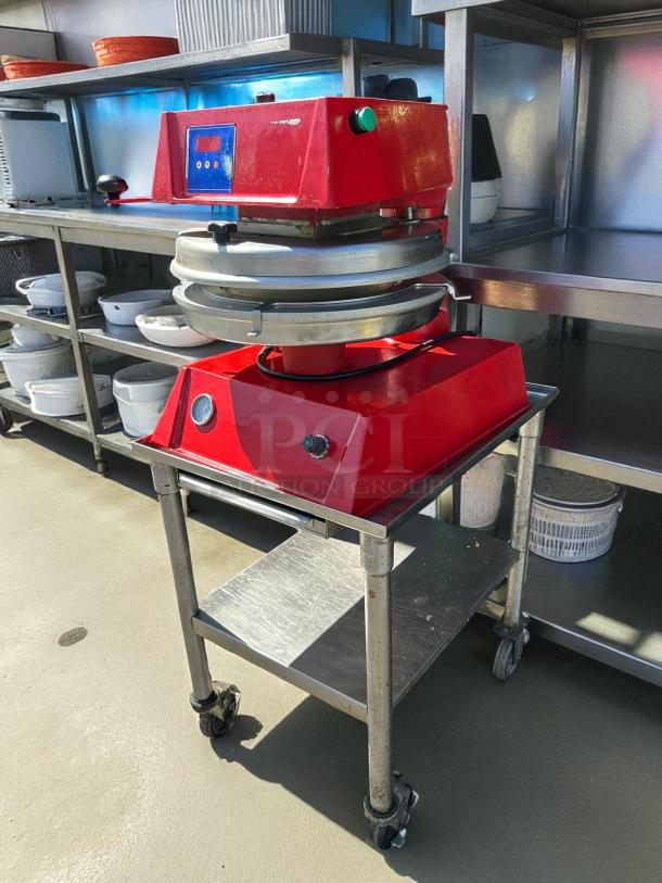 Proluxe DP2300 semi-automatic 12" pizza press, 115V, red finish, tested and working, without stand, in good condition.