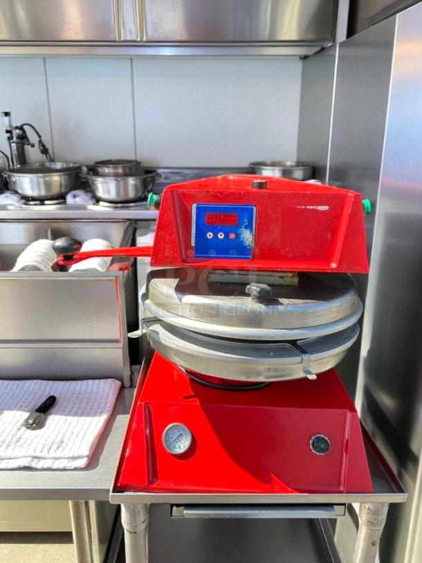 Proluxe DP2300 semi-automatic 12" pizza press, tested and working, red finish with control panel, no stand included.