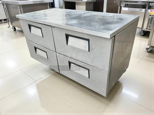 True TUC-60D-4-HC 60" undercounter refrigerator with stainless steel exterior, two sections, four drawers. Tested and working.