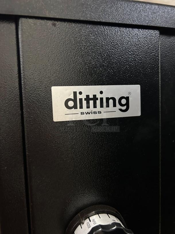 Ditting KR1203 coffee grinder, black, like new condition. Features clear Ditting Swiss label and adjustable grind dial.
