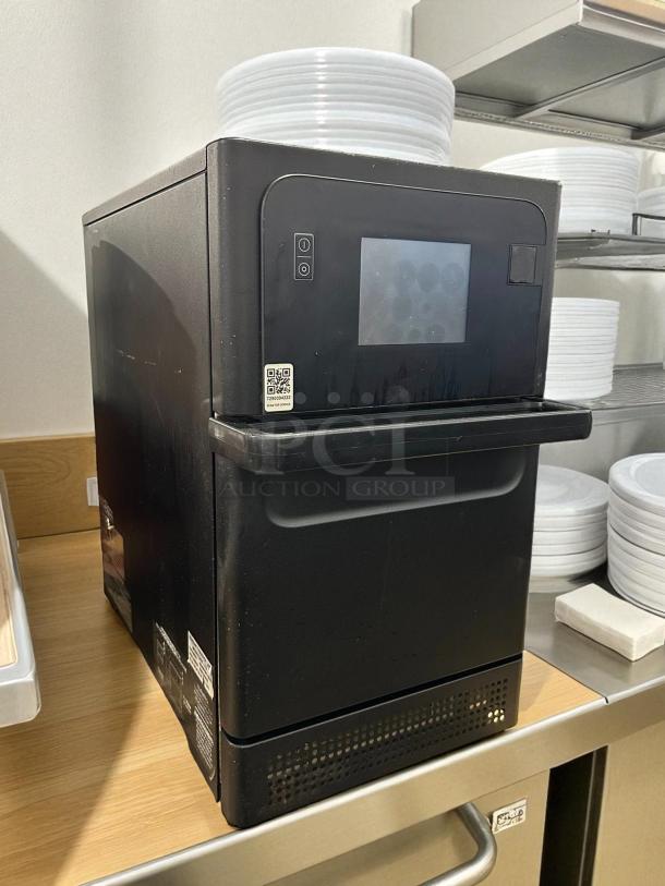 Merrychef eikon e2s oven, excellent condition, black exterior, touchscreen controls, tested, 208/240V, high-speed cooking.