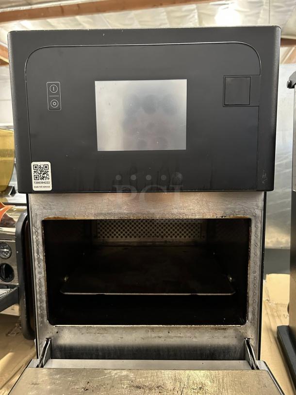 Merrychef eikon e2s Classic high-speed countertop oven, excellent condition, tested 208/240V, touch controls, QR code visible.