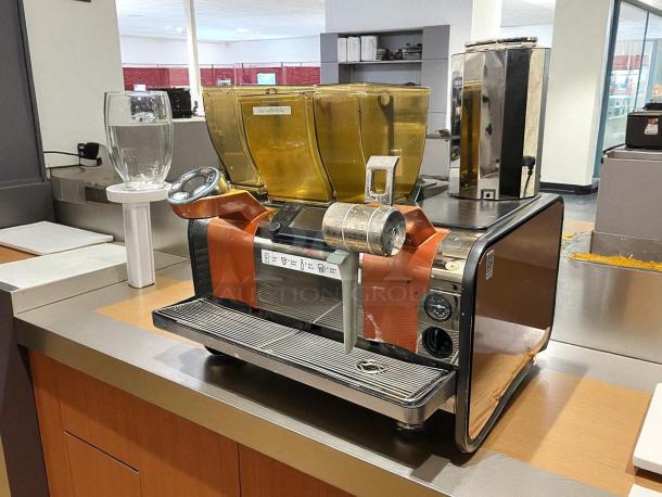 Starbucks Thermoplan Mastrena II Espresso Machine, sleek design, dual bean hoppers, digital interface, excellent condition.