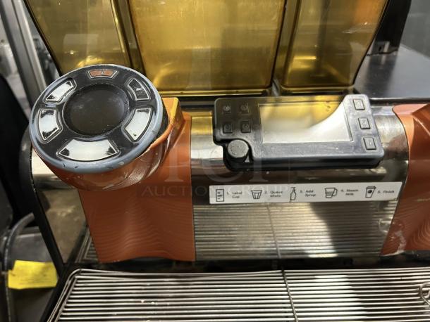 Starbucks Thermoplan Mastrena II Espresso Machine; control panel, buttons, and instructions visible; robust condition.