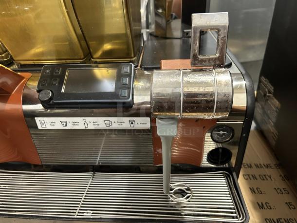 Starbucks Thermoplan Mastrena II espresso machine, stainless steel finish, touchscreen controls, labeled panel, used condition.