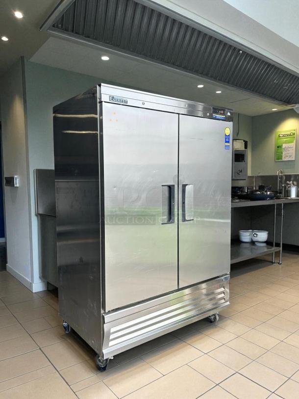 Everest EBR2 54" reach-in refrigerator, two solid doors, left/right hinge, 115v, excellent condition, on casters.