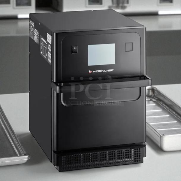 Brand new Merrychef eikon e4s high-speed cooking oven in original packaging. Black, touchscreen, countertop model.