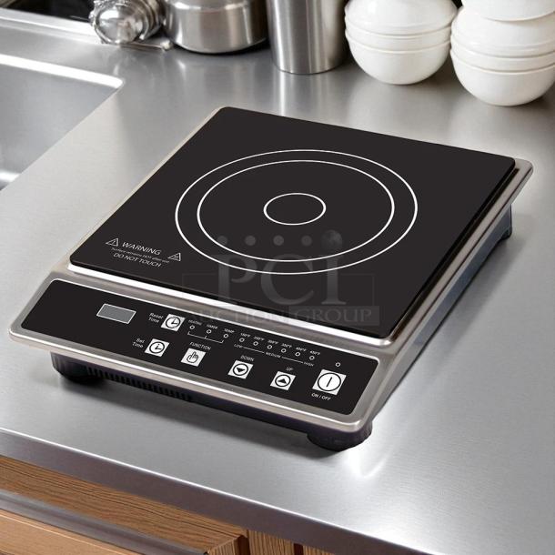 Global Solutions GS1681 countertop induction range with 1 burner, 120v, in packaging, new condition. Control panel displayed.
