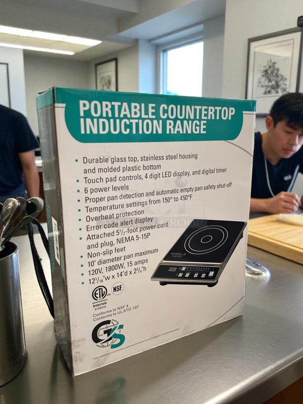 Global Solutions GS1681 countertop induction range, new in packaging. Features include durable glass top, six power levels, 120V.