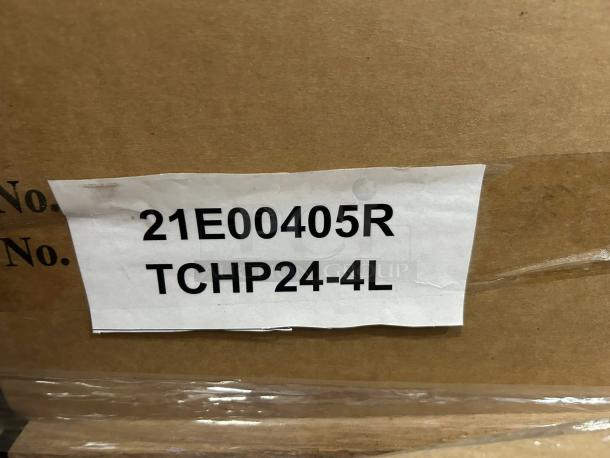 Alt text: Therma-Tek TCHP24-4 burner gas hotplate label on packaging, showing model number and serial number, brand new condition.