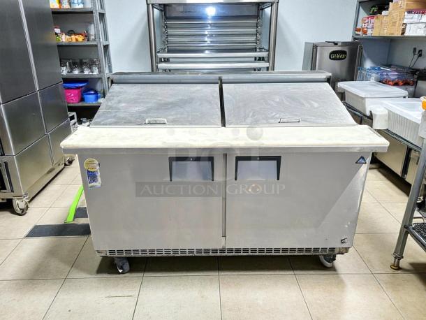 Everest EPBWR2 59" prep table, excellent condition, two-section, 24 pans, stainless steel, tested, working, wheels.