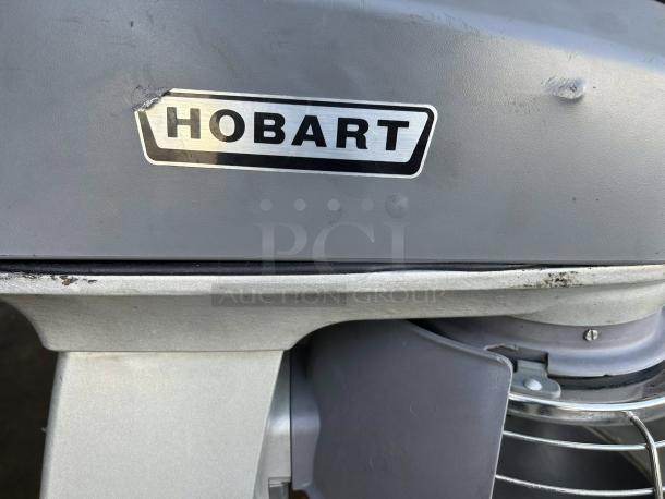 Hobart Legacy+ HL200 20 Qt. Planetary Mixer, visible wear, includes guard, tested and working, logo plate on housing.