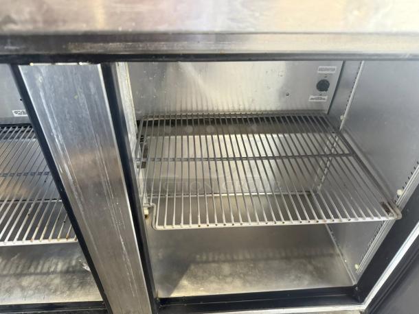True TWT-72-HC worktop refrigerator, 72", three sections, excellent condition, visible shelving inside, tested and working.