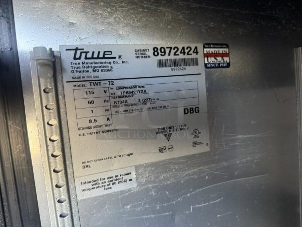 Label on True TWT-72-HC worktop refrigerator, 115v, model details, serial number 8972424. Made in USA.