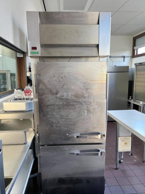 Great condition McCall MDL 1-102001 single door reach-in refrigerator; stainless steel, tested, working, minor surface marks.