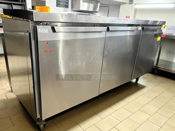 Continental Refrigerator SW72-N-BS 72" Worktop with Backsplash. Stainless steel, three doors, good condition, on casters.