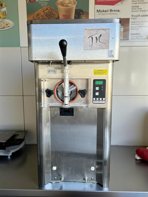 Stoelting F111 Gravity-Fed Soft Serve/Frozen Yogurt Machine in excellent condition. Features control panel, tested and working.