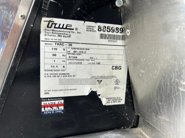 Label on True THAC-36-HC-LD cooler with 115V, R134A refrigerant, and "Made in USA" marking.
