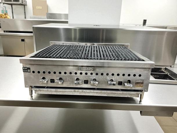 Vulcan VCRB36 36" Radiant Charbroiler in stainless steel, natural gas, tested and working. Features adjustable knobs and vented design.