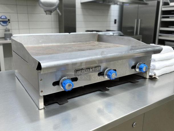 Imperial ITG-36 36" commercial gas griddle with thermostatic controls, tested and working, minor surface wear, stainless steel.
