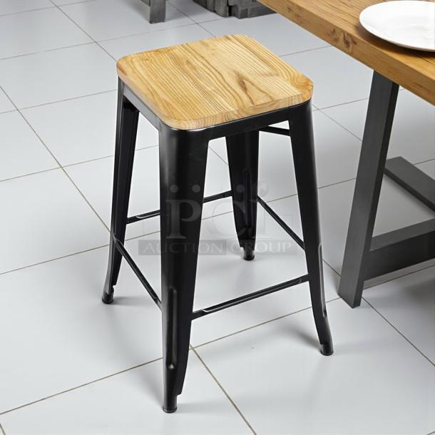 Design Form industrial counter bar stool, 26" height, wood seat, black metal legs, 330LB capacity, great condition.