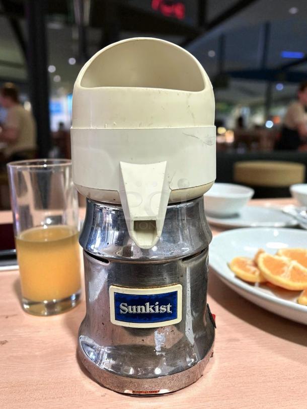 Sunkist J-1 Commercial Citrus Juicer, 115V, 3450 RPM, excellent condition. Features logo. Tested and working.