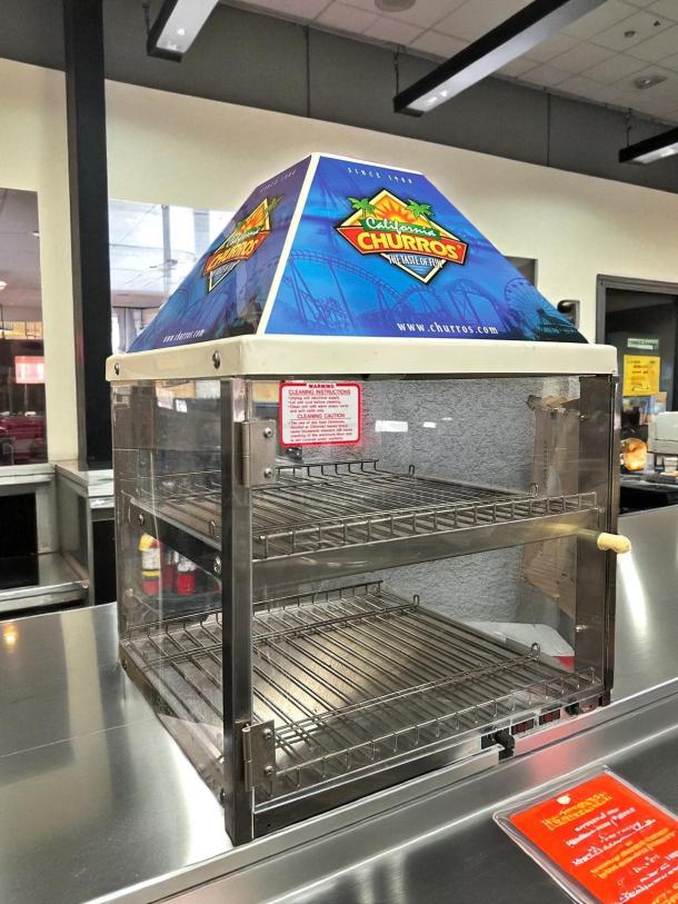 Wisco 680-1 food warmer, excellent condition, black cabinet, single glass door, two shelves, branded top, visible label.