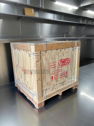Wooden crate containing a Nieco JF93E Electric Broilvection automatic broiler, 208 volts, 3 phases, new condition.