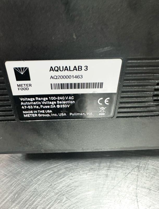 METER Control Unit label showing model AQUALAB 3, voltage range 100-240V AC, and serial AQ200001463. Made in USA.