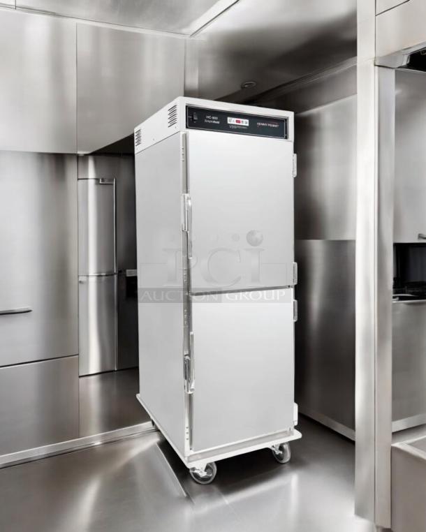 Factory New Henny Penny HHC900.24 full-height insulated mobile heated holding cabinet, 15-pan capacity, 120V, ready for use.