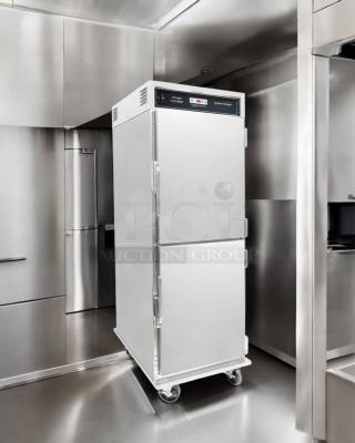 Factory New Henny Penny HHC900.24 full-height insulated mobile heated holding cabinet, 15-pan capacity, 120V, ready for use.