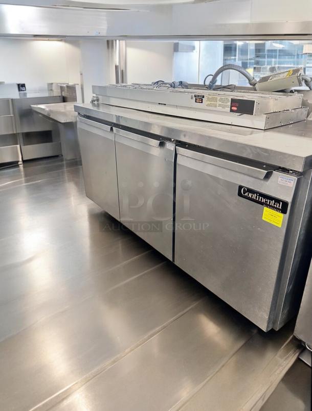 Continental Refrigerator 3-door sandwich prep table, Model SW72-AS-BS, in outstanding condition, tested and fully working.