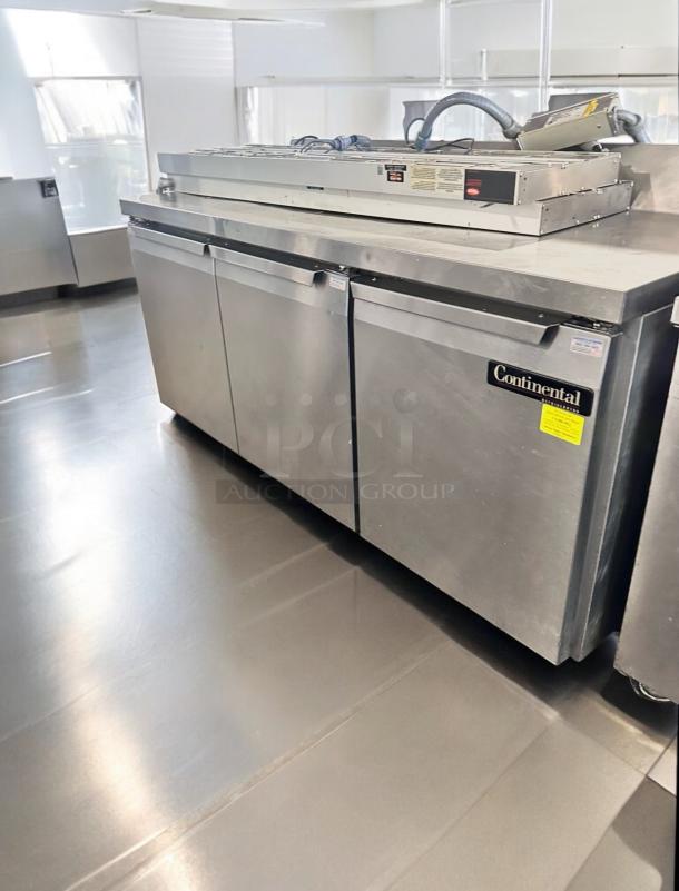 Continental Refrigerator 3-Door Sandwich Prep Table, Model SW72-AS-BS, stainless steel, excellent condition, tested and working.