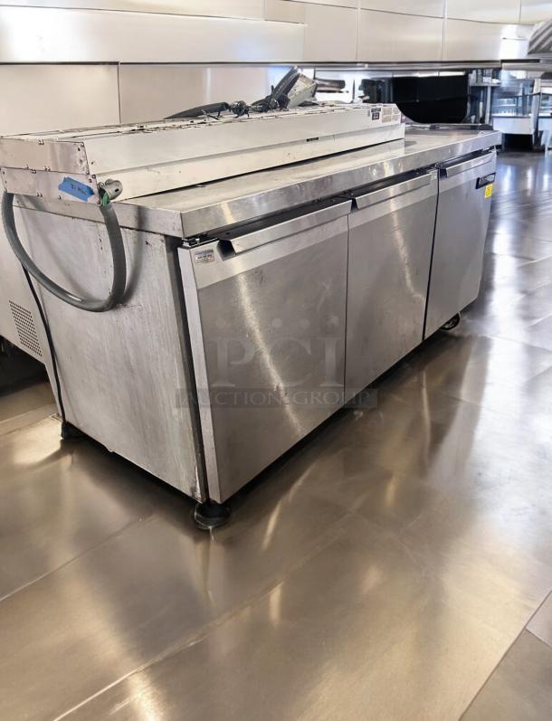 Continental Refrigerator 3-Door Sandwich Prep Table, Model SW72-AS-BS, stainless steel, tested and working, excellent condition.