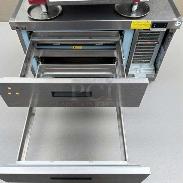 Delfield F2936CP two-drawer refrigerated chef base in superb condition, fully tested, 115V, with visible warning and brand labels.