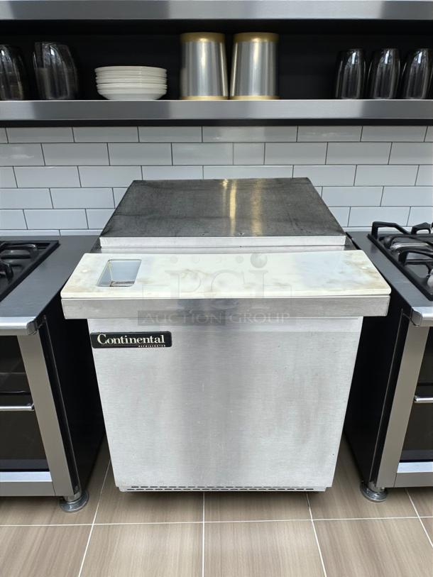 Continental SW27-12M undercounter sandwich prep table, stainless steel, 115V, superb condition, labeled "Continental Refrigerator."